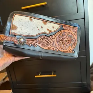 Tooled leather and cowhide toiletry bag