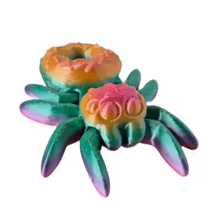 Shimmering Rainbow Donut Spider Collectible Figurine with Vibrant Colors and Unique Design