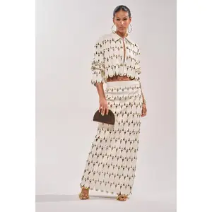 THE SNEAK PEEK STUDDED PU MIDI SKIRT IN WHITE