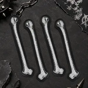 Gothic embroidered long bones punk heat transfer patch set, 4 pieces, cuttable fabric patches suitable for heat pressing or sewing, ideal for clothing, backpacks, and DIY decoration.
