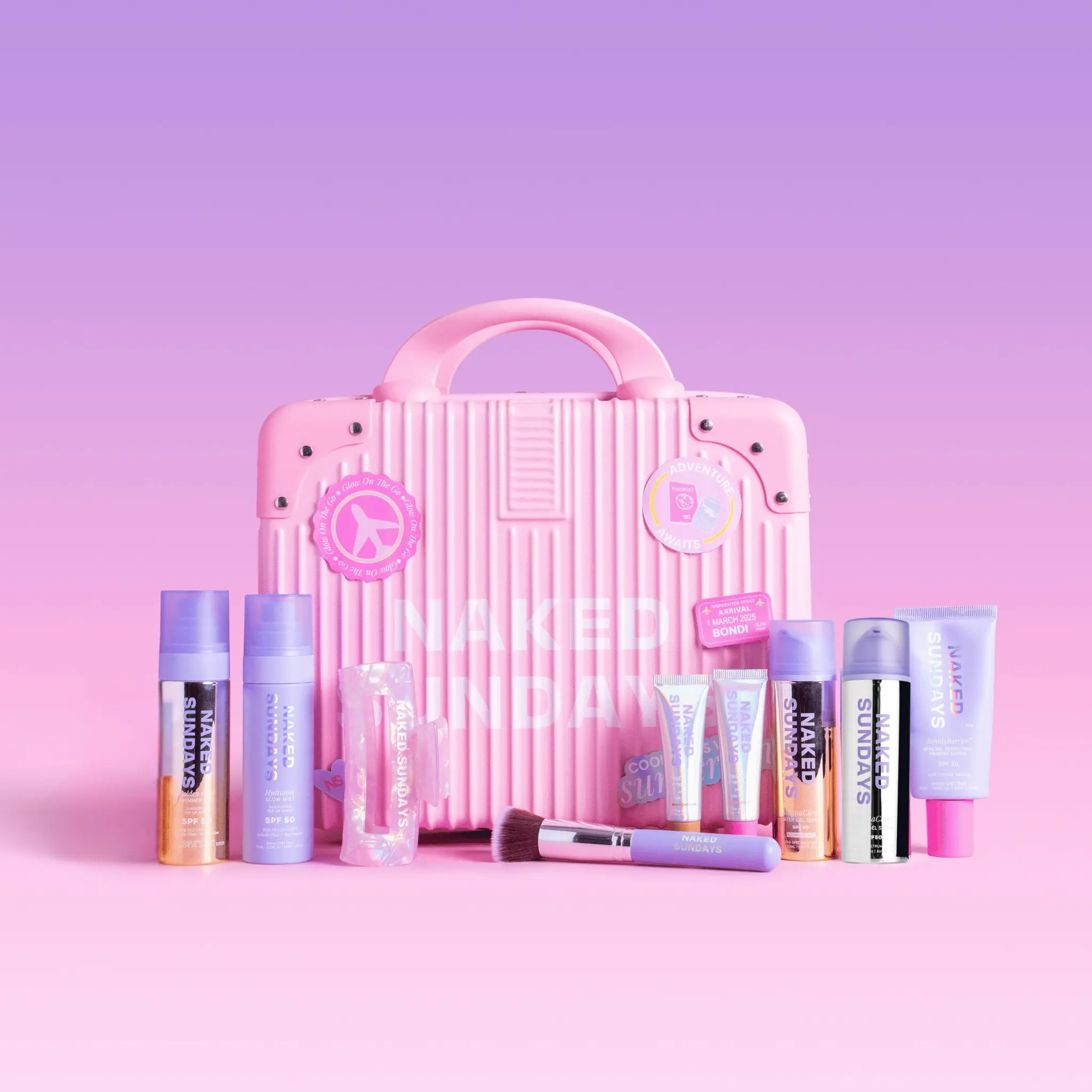 First Class Jetsetter Beauty Bundle Kit - Mini Exclusive Pink Suitcase plus Naked Sundays bestselling SPF and Skincare products  (SAVE 60%)