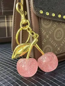 A fashionable and cute cherry design Kevchain, bag decoration, daily wear, also a surprising and exquisite small gift.