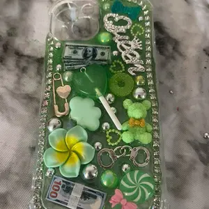 Junk Phone Cases with Colorful Designs and Characters Featuring Hello Kitty and Rainbows