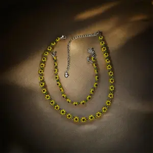 Matching sunflower necklace and bracelet