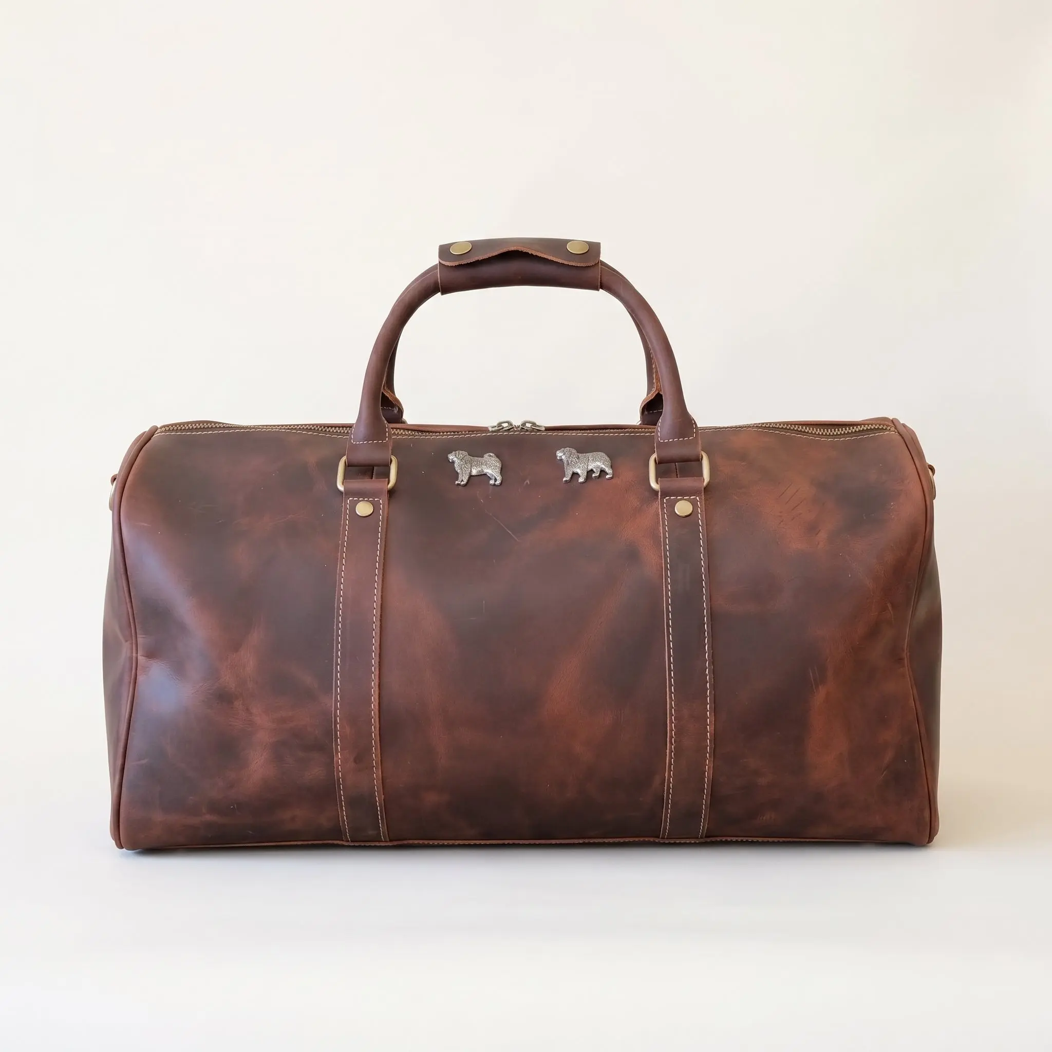 Lettie Heirloom Duffel Bag in Full-Grain Crazy Horse Leather, Travel Weekender with Shoe Compartment, No Wheels - 20" L x 11" H x 10" D, 20" L × 11" H × 10" D, Brass Zips, Included Luggage Tag, Adjustable Strap, Weekend Trips, Heirloom Craft, Brass Feet