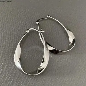 Women's Silver-Plated Brass Mobius Twist Hoop Earrings - Lightweight Spiral Costume Jewelry, Chic Everyday Accessory, 1.2 in x 0.8 in, Earring for Women
