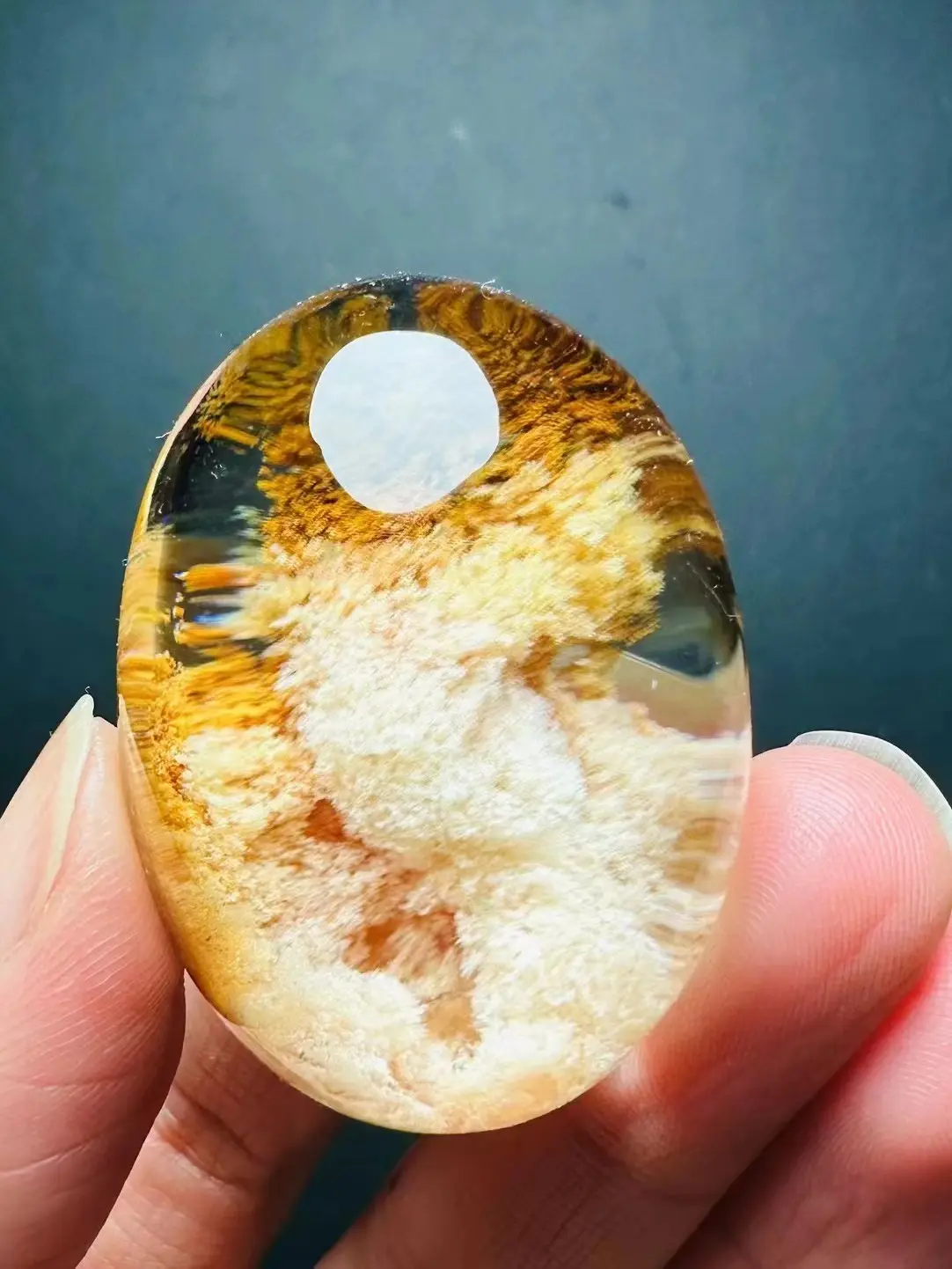 Natural color ghost treasure pot pendant <unk> Beautiful color, original taste... Watery, full, full head! Meaning: "wealth rising, treasure brings wealth" Size: 42/30.8/24.6 Weight: 44.3g