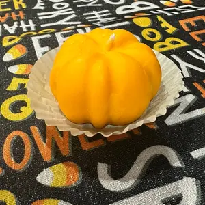 Pumpkin shaped candle