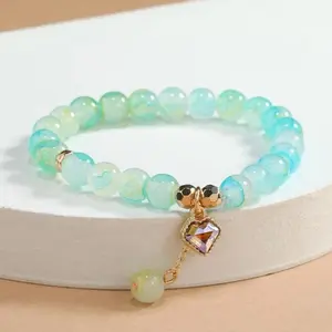 Rhinestone charm beaded bracelet