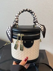 Simple black and white color matching classic woven cylindrhandbag     crossbody bag, double metal lock zipper closure, fashionable and versatile, suitable for daily commuting, shopping and dating, etc. Elegant Commuter Bag