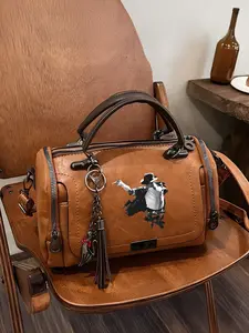 Michael Jackson dance moves depicted in Boston bag; lightweight handbag, a fashion enthusiast's gift for Mother's Day.