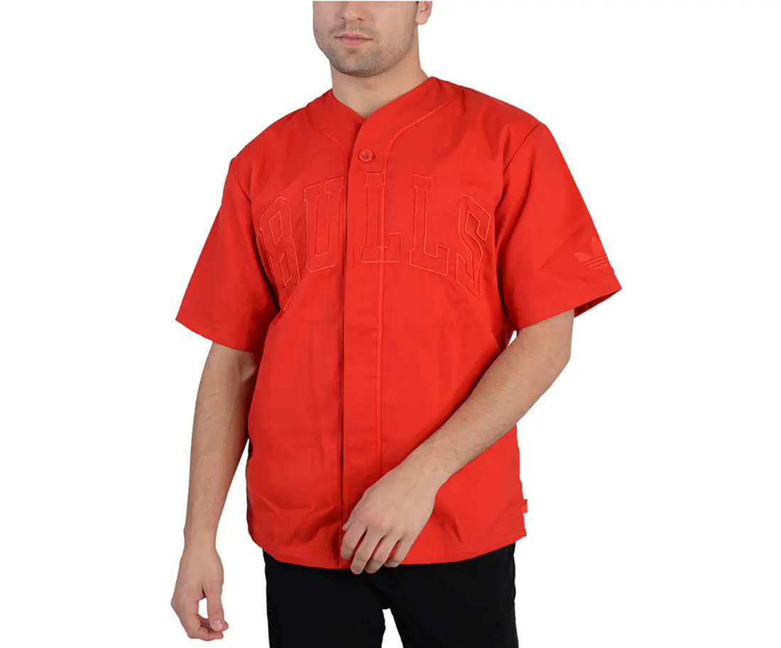 Chicago Bulls Team Name on Front Center Chest and NBA Logo on Bottom Right. Rounded Hemline and Front Button Down