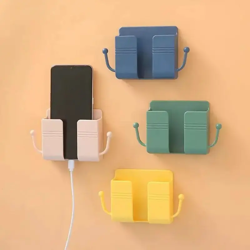 Mobile phone holder mounted on self-adhesive wall, wall-mounted mobile phone holder with hook and cable clip, wall-mounted mobile phone holder with charging plug and wall regulator, remote control suitable for kitchen and living room, (random colors)