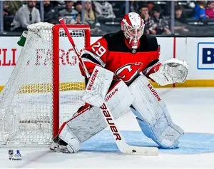 MacKenzie Blackwood New Jersey Devils Unsigned Red Jersey In Net Photograph