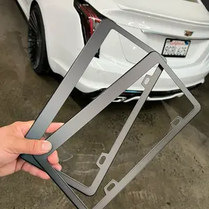 Set of 2 black license plate frames with hardware kit.