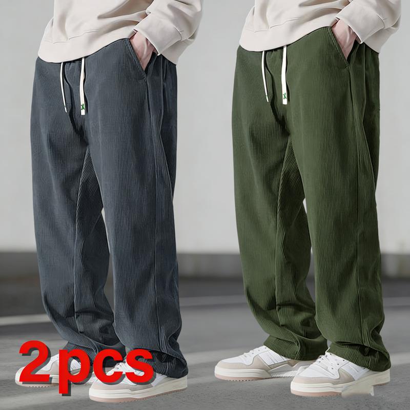 Two men's autumn casual pants featuring a simple and versatile style with drawstring design, adding a casual feel. The pants have delicate small details, such as stitching accents, making them comfortable and stylish. The loose fit provides comfort and fr