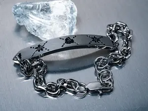 BUTREAL - Asteroid - Basic Titanium Cuban Chain Flower Logo Bracelet