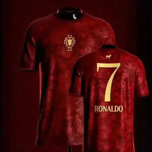 2026 Ronaldo #7 Portugal National Team Red GOAT Print Soccer Home Jersey Portuguese Cultural Pattern Gold Number Breathable Quick Dry Short Sleeve for Ronaldo Fans, Portugal Supporters, Football Collectors & Streetwear Enthusiasts.