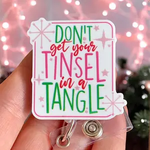Glitter My Badge Don’t get your tinsel in a tangle Christmas nurse badge reel for nurse and hospital workers. Badge clip Badge pull - Retractable swivel clip with a 360 rotation. Great gift for coworker.