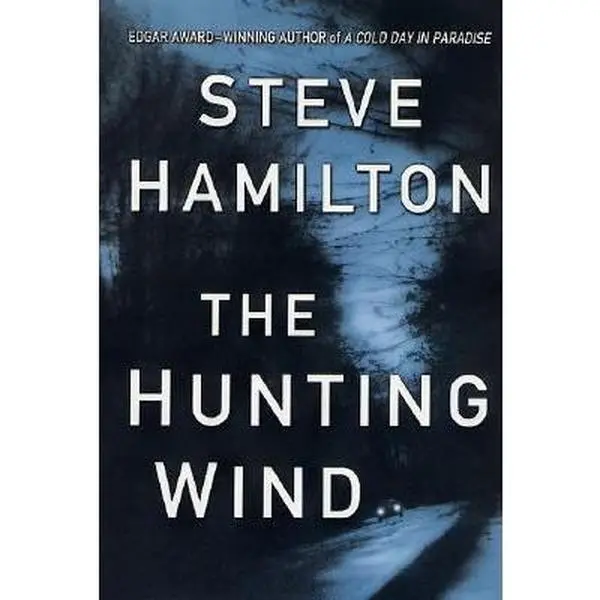 USED Book - The Hunting Wind: An Alex McKnight Mystery (Alex McKnight Mysteries (Hardcover)) by Steve Hamilton (Hardcover) - english