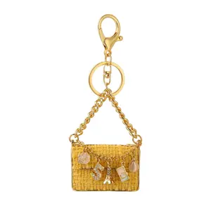Creative small gift, Xiaoxiang style bag, keychain, small pendant, metal key chain pendant, small commodity, cute.