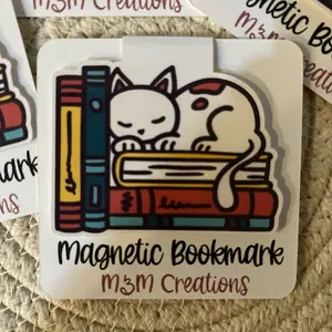 Sleepy cat on books magnetic bookmark pair (2)