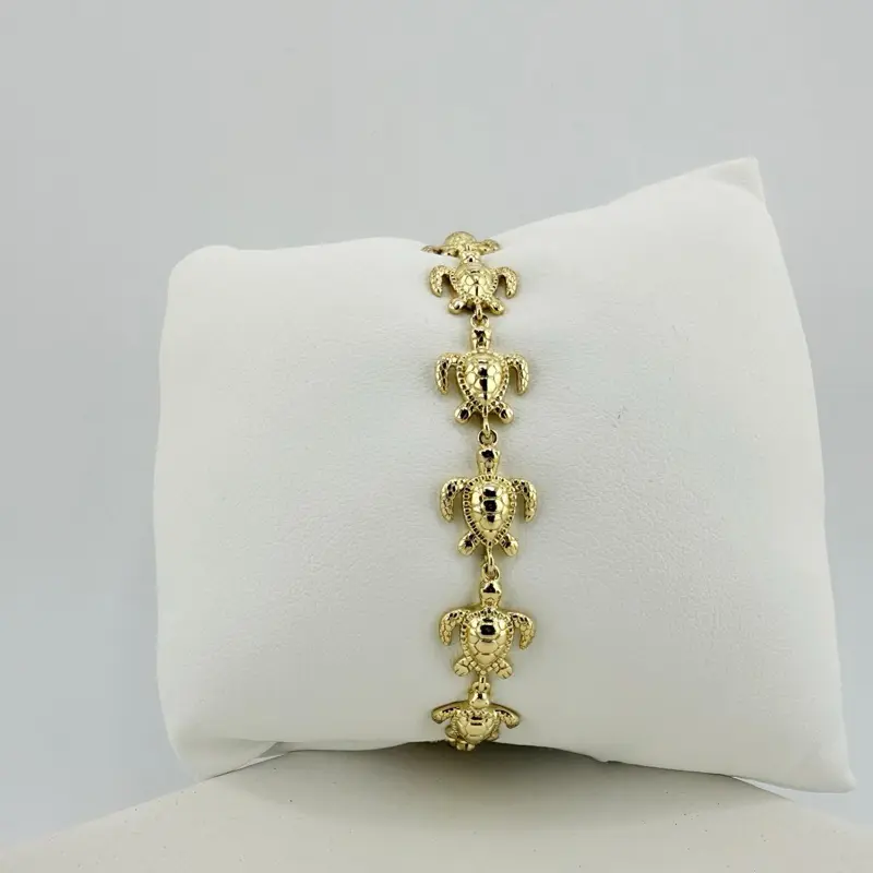 Gold Plated Turtle Designs Bracelet - Elegant Gold Finish with Turtle Motifs