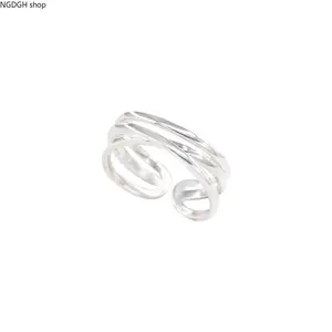 Adjustable Silver Triple Band Open Ring, Twisted Interlocking Design, Polished Finish, Perfect for Everyday Layering, Minimalist Style & Adding Modern Sculptural Flair