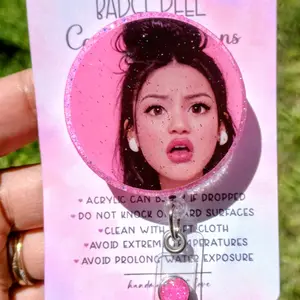 Disgusted Doll Badge Reel (Asian)