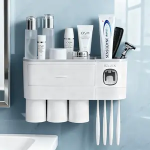 Modern Wall Mounted Toothbrush Holder with Dual Automatic Toothpaste Dispensers & Quick-Emptying Cups for Bathroom Organization Durable Plastic Design Organizing Sticky Hook