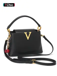 Stylish black ladies' evening clutch bag, handbag, handheld bag, fashionable purse handbag, accessories and charms, cherry-themed embellishments, perfect for weddings, parties and complementing your handbag ensemble.