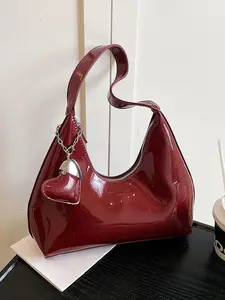 Niche design dumpling bag, crescent bag, solid color simple baguette shoulder underarm bag, retro patent leather versatile style, simple and elegant commuter bag, suitable for office workers, dating, afternoon tea photos, etc.