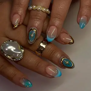 24pcs Clear Nude Foundation Color with Ice Blue Gradient, Gold Frame Stars Decoration, Short Square Nails, Glossy Finish, and Golden