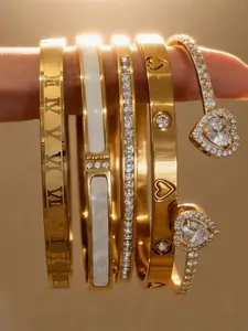 5-piece 18K gold-plated stackable bracelet set, featuring Roman numerals, shells, artificial zirconia, and heart designs; hypoallergenic stainless steel jewelry designed for women