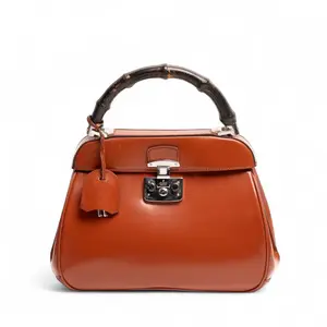 Pre-owned GUCCI Patent leather Clutches & Wristlets Lady Lock, Bamboo Top handle Bag