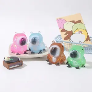 Crystal Kapibala Squeezable Toy, with transparent glitter, soft and bouncy texture, 3D guinea pig shape, a stress-relieving and mood-soothing toy, suitable for office breaks, leisure activities, and a perfect gift for friends.
