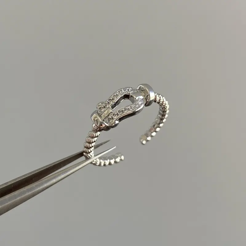 Silver horseshoe buckle ring