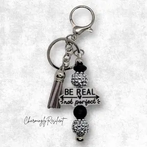 CharminglyResilient Be Real Not Perfect Keychain with Tassel and Beads for Stylish Accessory