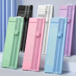Compact Manual Paper Cutter, Four-Color Mini Photo Trimmer with Grid Pattern, Precision Cutting for Scrapbooking and Crafts, Durable Plastic, Office Supplies