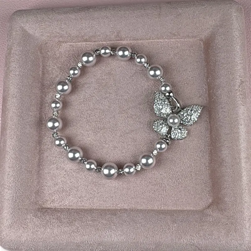 Faux pearl cz butterfly bracelet