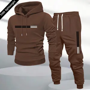 Men's long-sleeved hooded sweatshirt and sweatpants fashion set, featuring a kangaroo pocket and letter stripe print, lightweight two-piece men's spring and autumn collection.