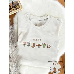 Round-neck sweatshirt embroidered with the state flower of Texas, the bluebonnet, personalized t-shirt with a graphic of the USA's state flower, Texas 1845 gift t-shirt, American cowgirl t-shirt from the state of Texas for women.