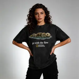 National Geographic “Ride the Flow” unisex vintage T-shirt, Renaissance aesthetic, loose fit, 100% cotton, Y2K street style
