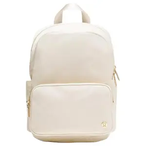 Lululemon Everywhere 11.5L Backpack for Women – Stylish, Minimalist, Light Ivory with Oak Brown and Gold Accents