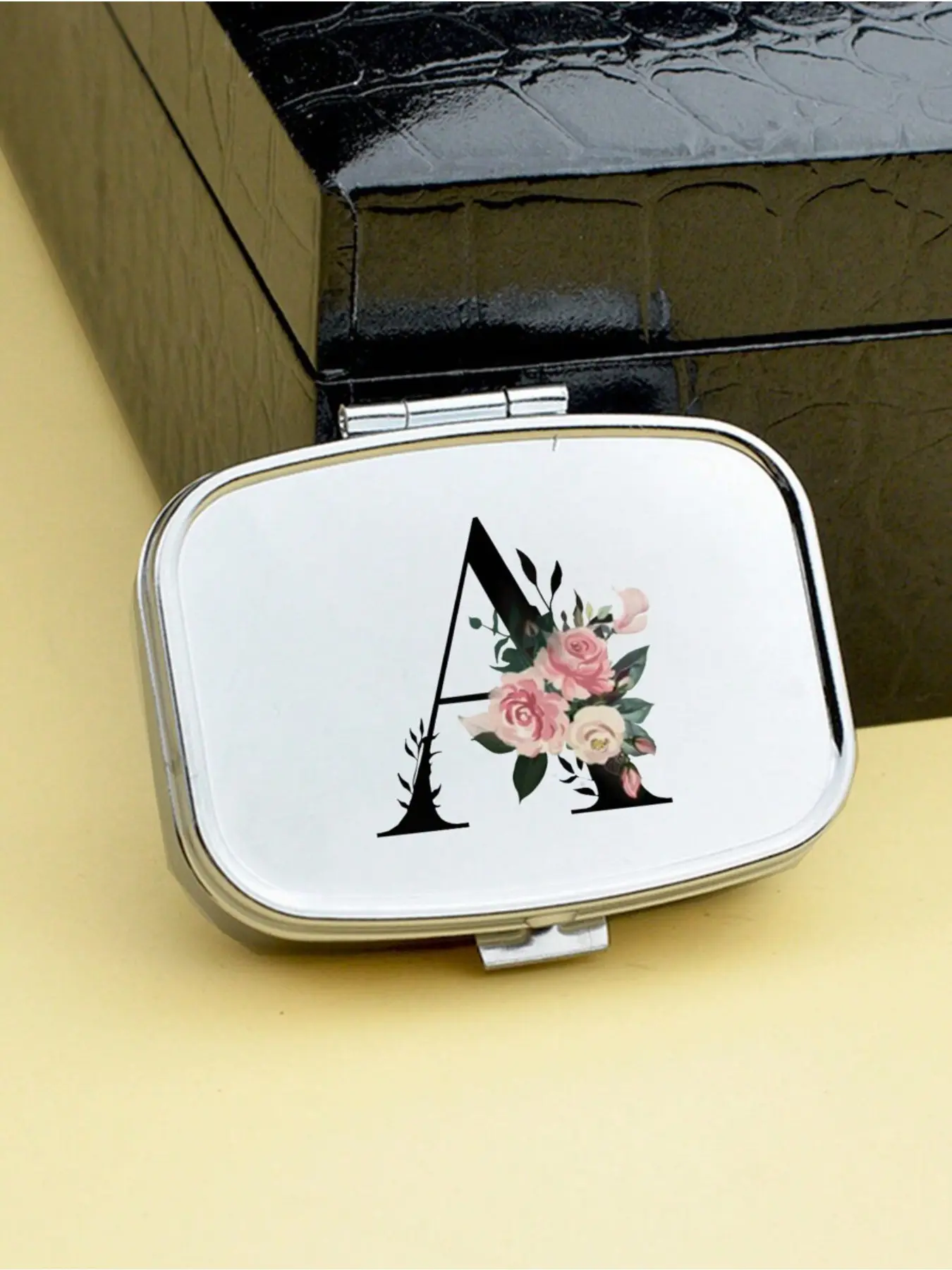 Personalized Pink Flower & Black Letter Square Pill Box, 2 Compartment Portable Pill Organizer, Supplement Organizer, Mini Metal Storage Box, Compact Jewelry Pill Case, Customizable Initial (A-Z) Gift, Suitable For Dorm, Bathroom, Camping First Aid Kit