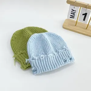 Women’s Ripped Knitted Beanie Soft Woolen Winter Hat for Outdoor Sports Parties and Daily Wear