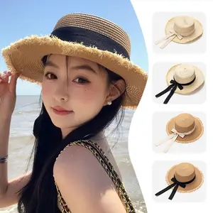 Bow rough edge flat top straw hat women's summer seaside beach vacation Japanese Hawaiian sun braided visor hat outdoor shading summer braided hat round hat