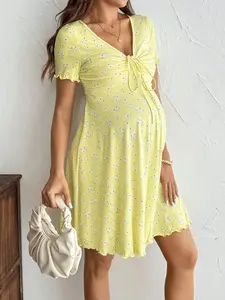 ELERENZO Maternity Ditsy Floral Ruffle Knot Lettuce Hem Short Dress – Vibrant Summer Yellow Pregnancy Sundress | Charming Ruffle Trim & Front Knot Detail Maternity Mini Dress | Flattering Sweetheart Neck Lettuce Trim Everyday Dress