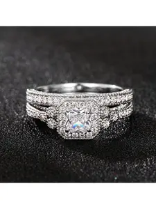 New pair of diamond-set wedding rings for women. Luxurious wedding accessories. Fashionable and trendy banquet style.