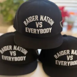 Raider Nation vs Everybody Snapback Hat - Black Cap with Bold White Text for Sports Fans